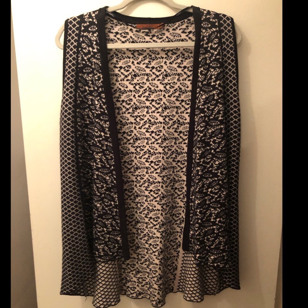 Black and cream vest